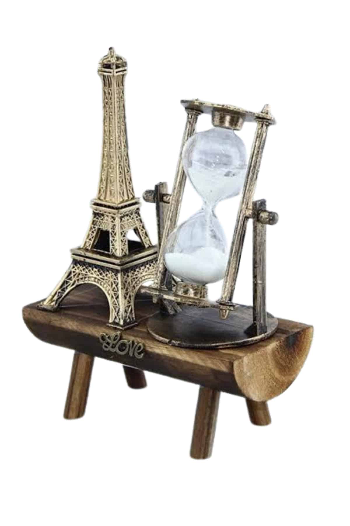 bu Eyfel Kulesi figürlü kum saati tam aradığınız parça olabilir. Şeffaf camdan üretilmiş olan kum saatinin içinde yer alan beyaz kristal kum taneleri