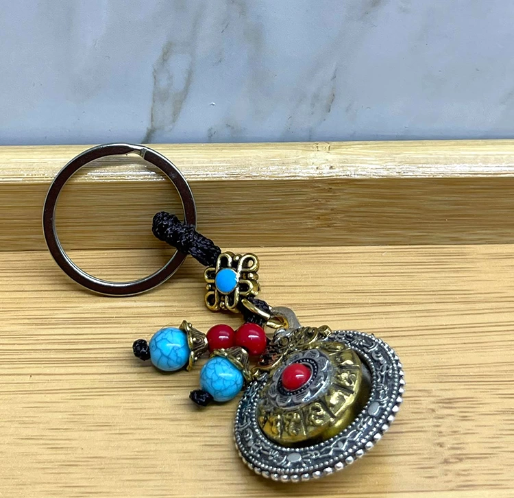 Mantra Carki Sans Anahtarlik 139863352 Sw750sh726 700x678 Mantra Çarkı Şans Anahtarlık najmaddin.com Mantra Çarkı Şans Anahtarlık