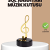 Altın sol anahtarı figürlü dönen müzik kutusu
