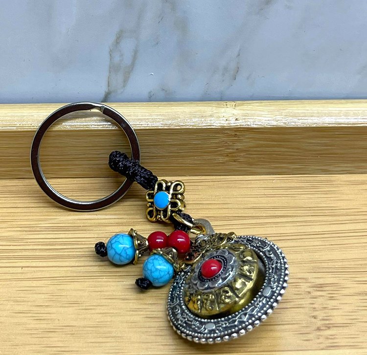 SHT95225 Alk4465 700x678 Mantra Çarkı Şans Anahtarlık najmaddin.com Mantra Çarkı Şans Anahtarlık